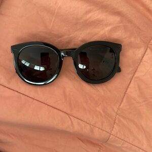 Black Karen Walker sunglasses!